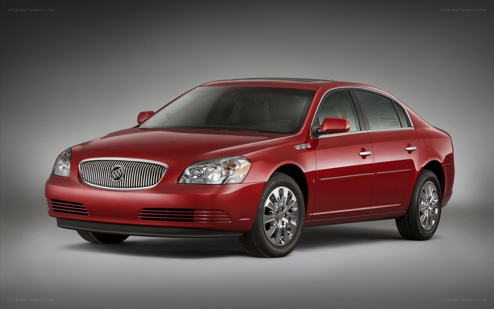Red Buick Lucerne sedan