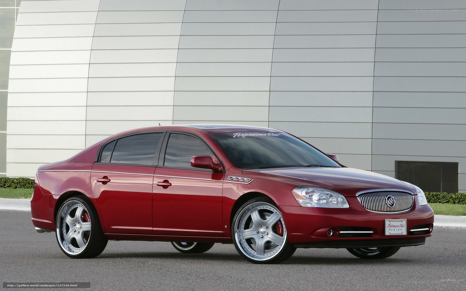 Red Buick Lucerne sedan