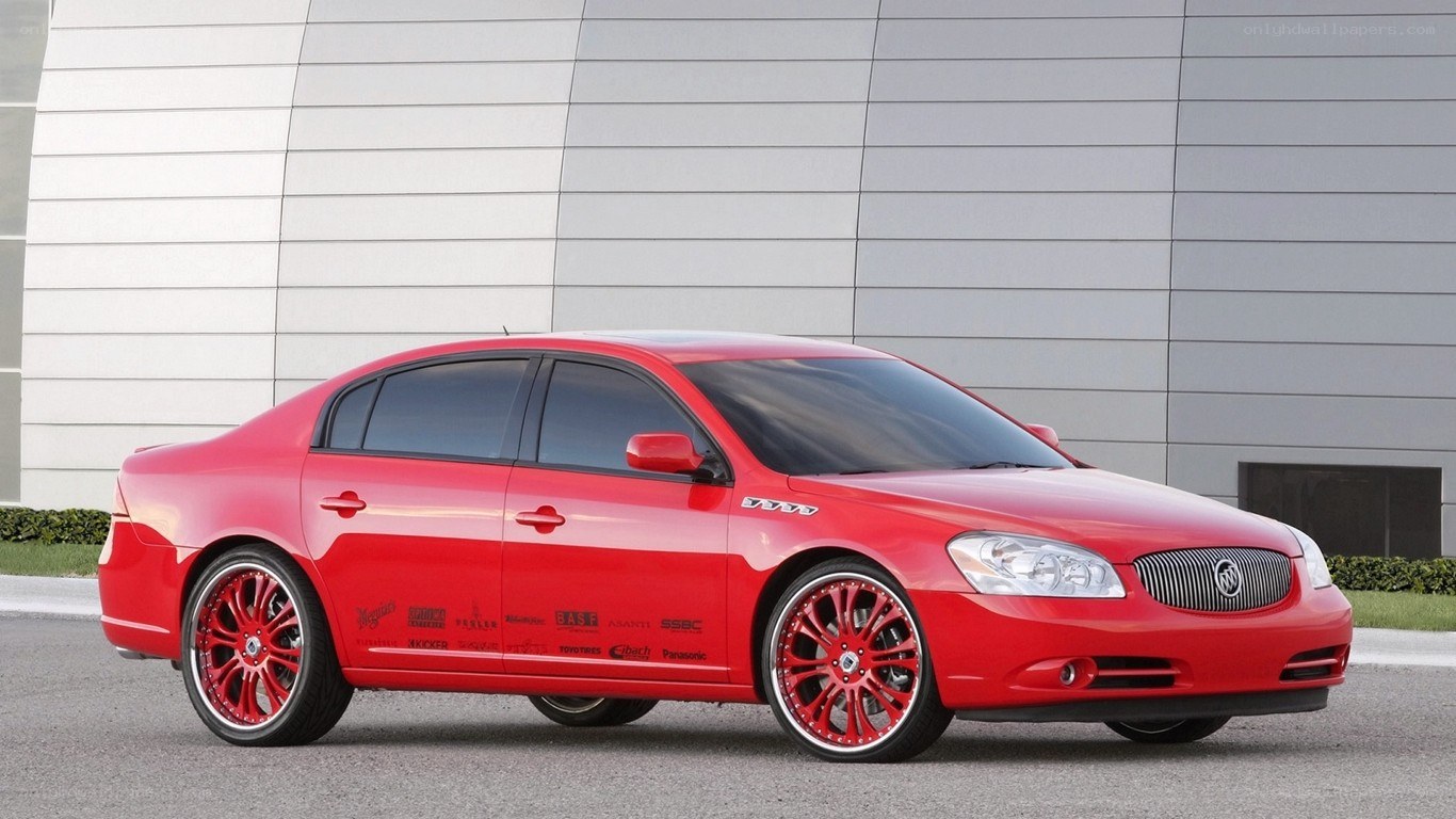 red buick sedan with custom wheels