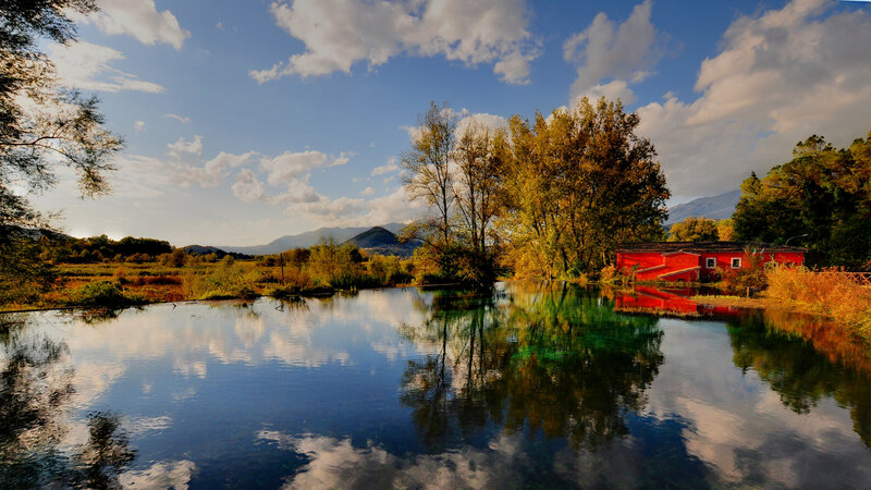Red Building by Lake