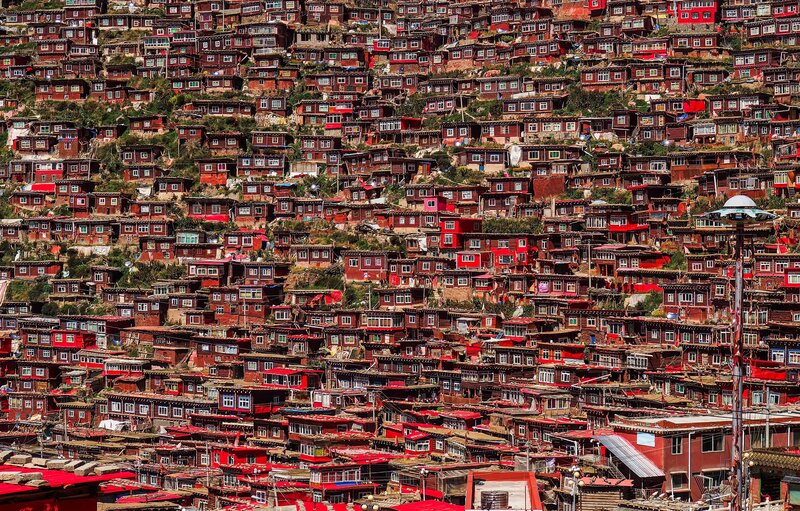 Red Buildings on Hillside