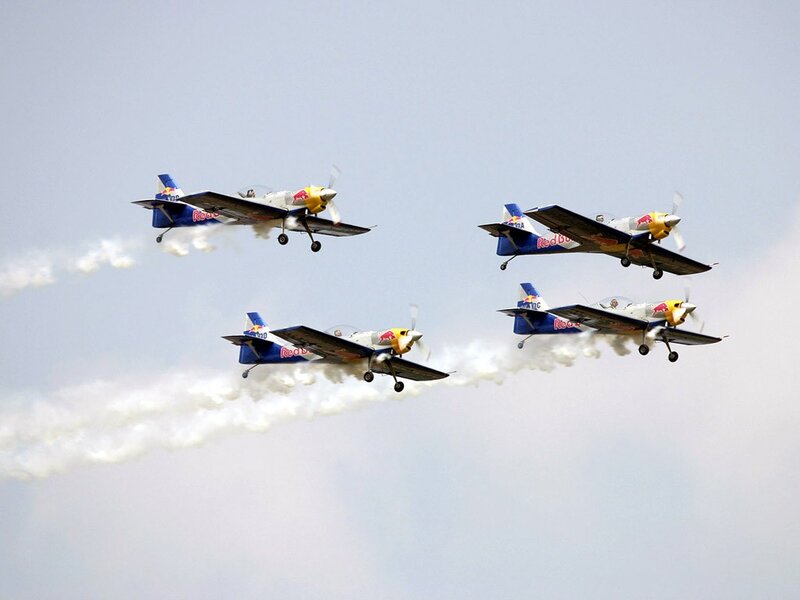 Red Bull aerobatic team in flight