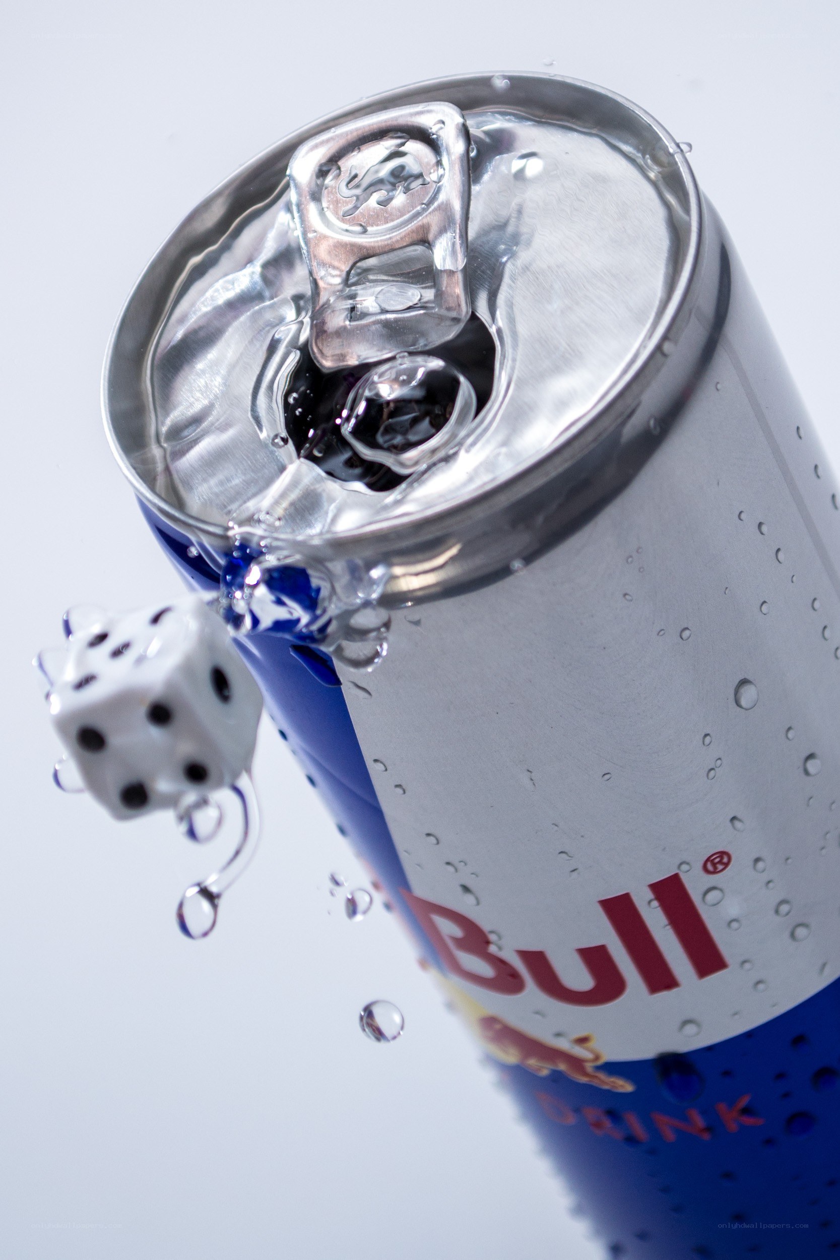 Red Bull can with dice