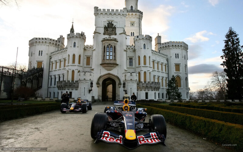 Red Bull F1 cars at a castle