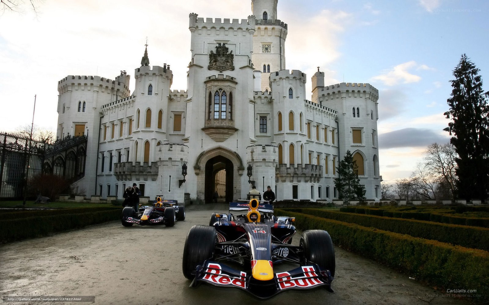Red Bull F1 cars at a castle