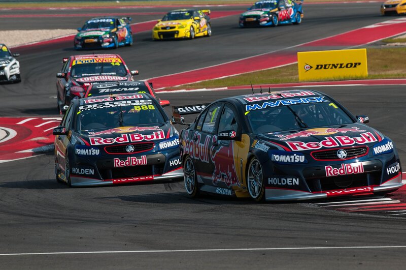 Red Bull racing cars on track