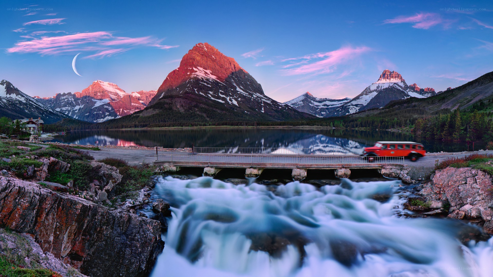 Red bus at mountain lake