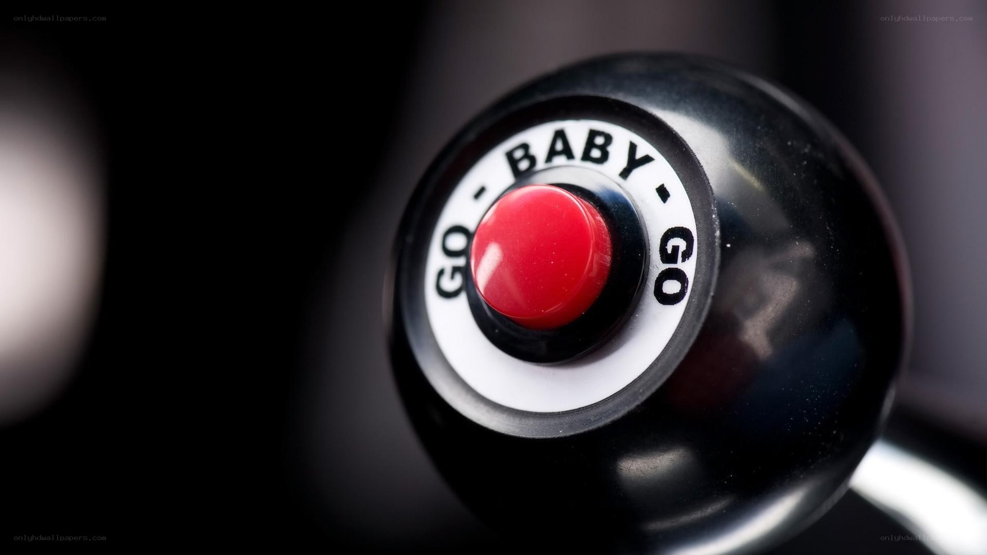 red button on black knob