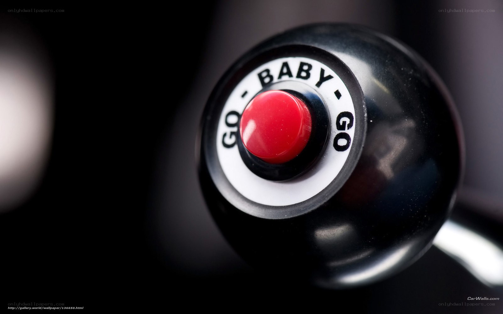 red button on black knob