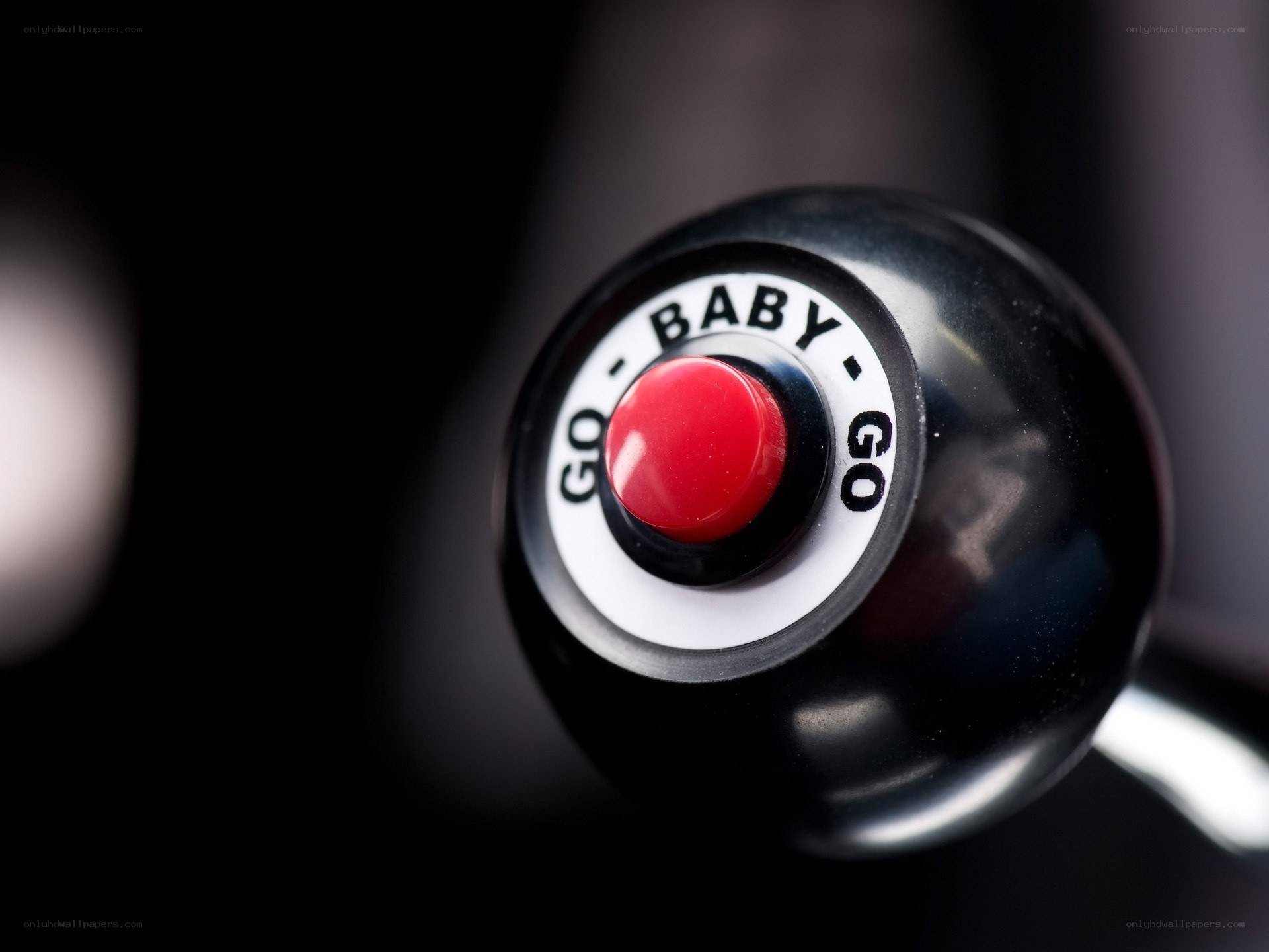 red button with go baby go text