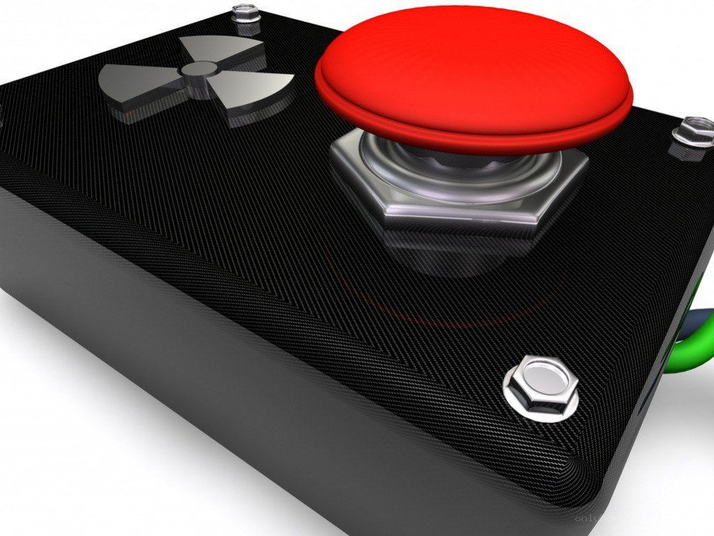 Red button with nuclear symbol