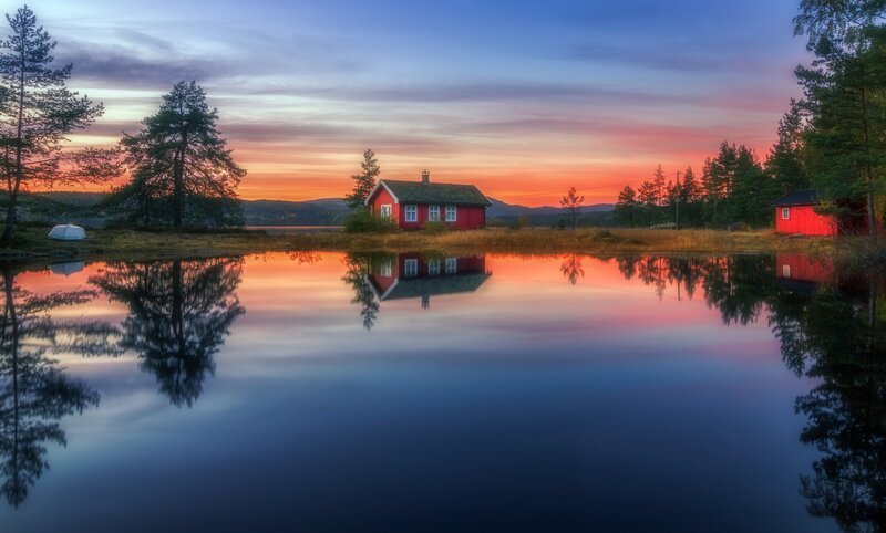 Red Cabin by Lake — Blue, Serene, Sunset, Photograph, Trees
