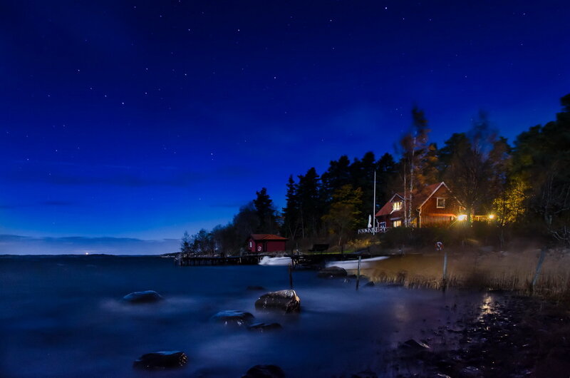 Red Cabin by the Water — Blue