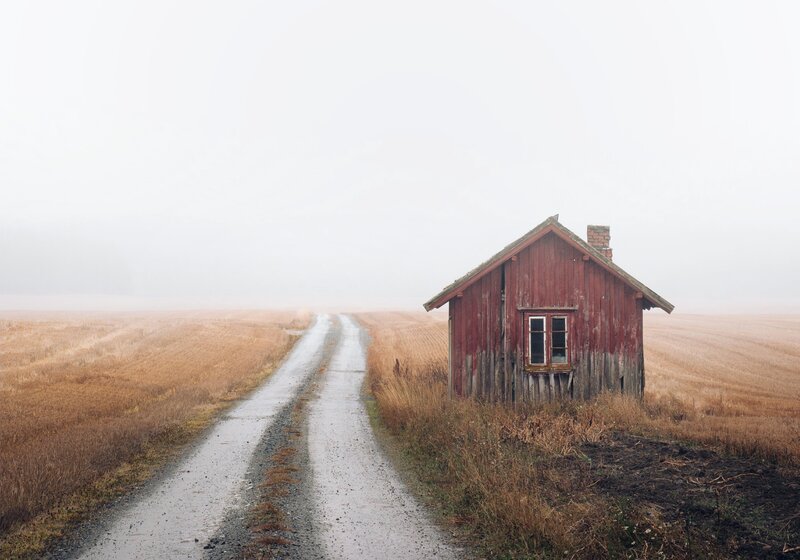 Red Cabin on Dirt Road