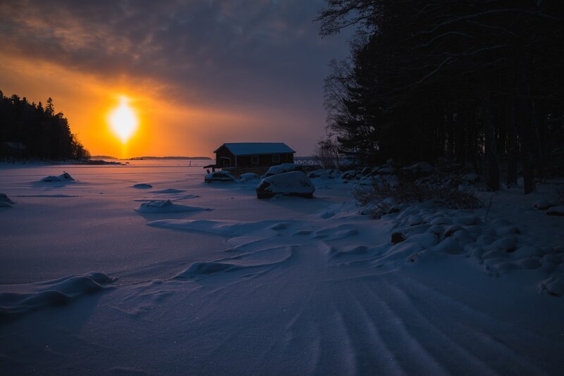Red Cabin on Frozen Lake — Orange