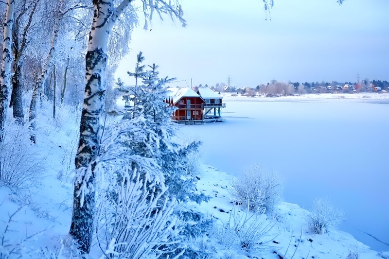 Red Cabin on Frozen Lake