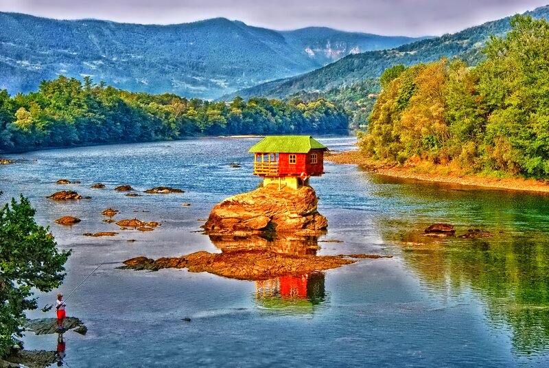 Red Cabin on Rock