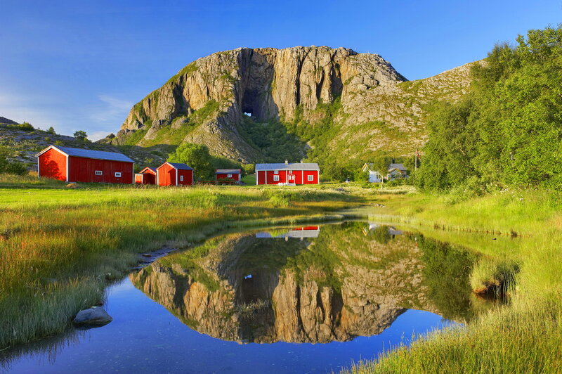 Red Cabins by Mountain