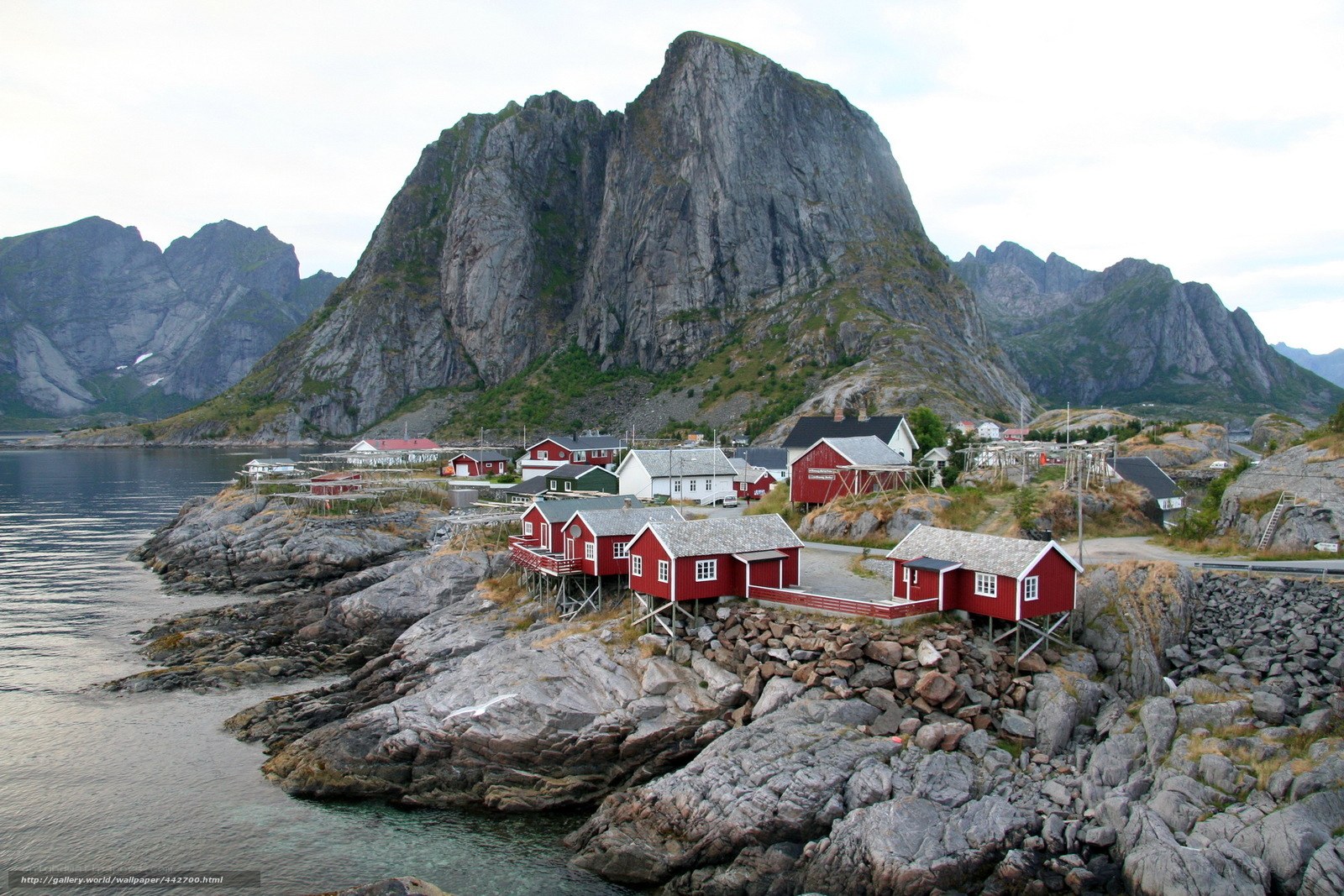Red cabins by the fjord