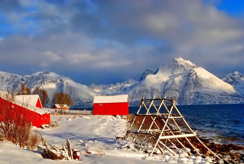 Red Cabins in Snow — Dramatic