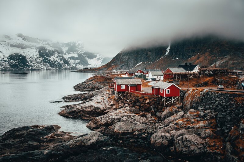 Red Cabins on Coast — Dramatic, Winter