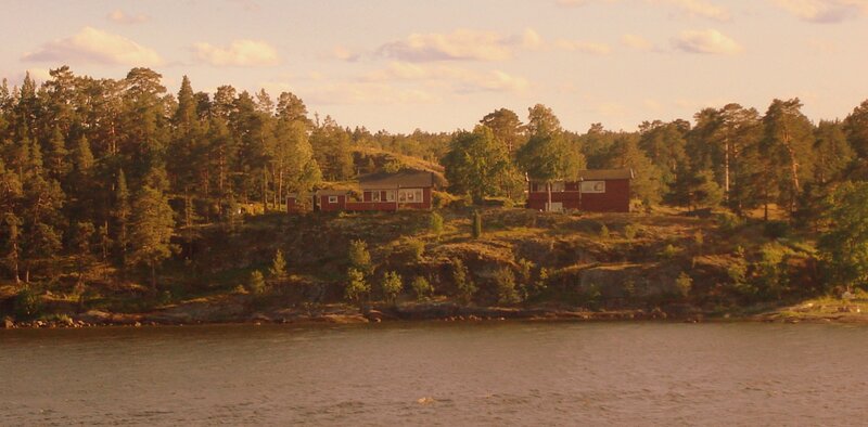 Red Cabins on Hillside