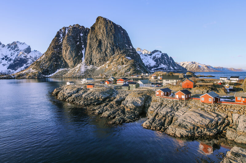 Red Cabins on Rocks — Blue