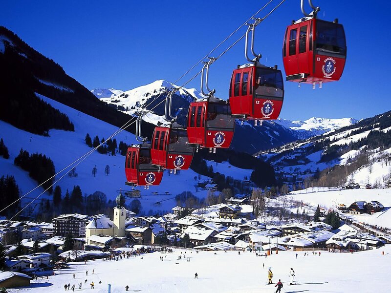 Red Cable Cars over Village
