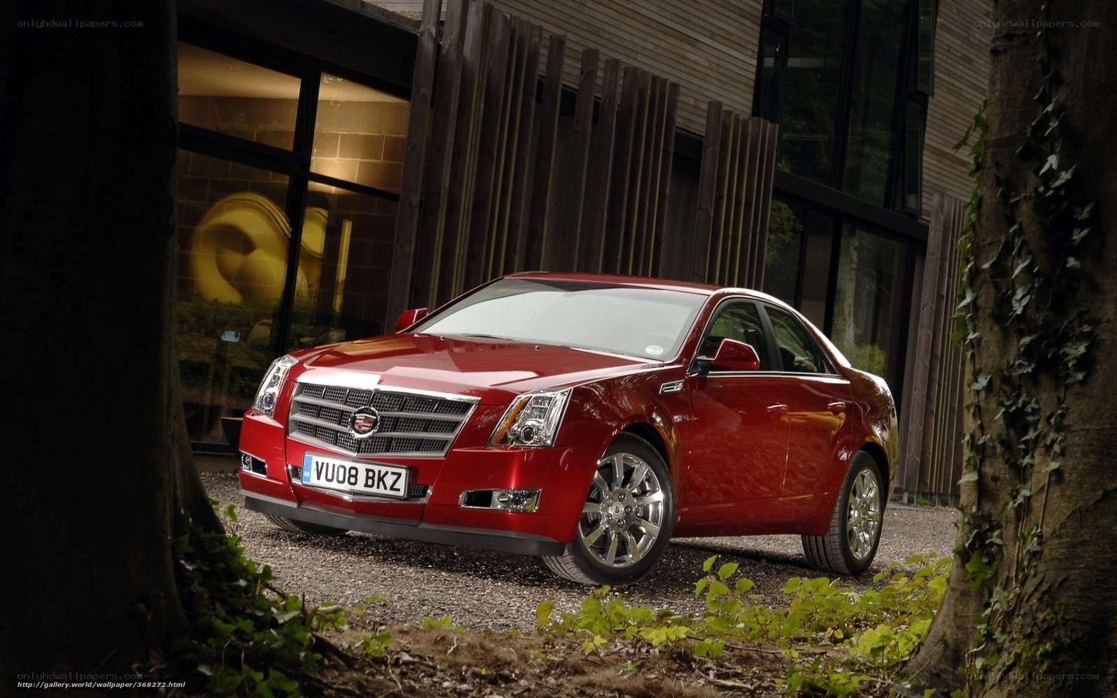 Red Cadillac CTS parked outside