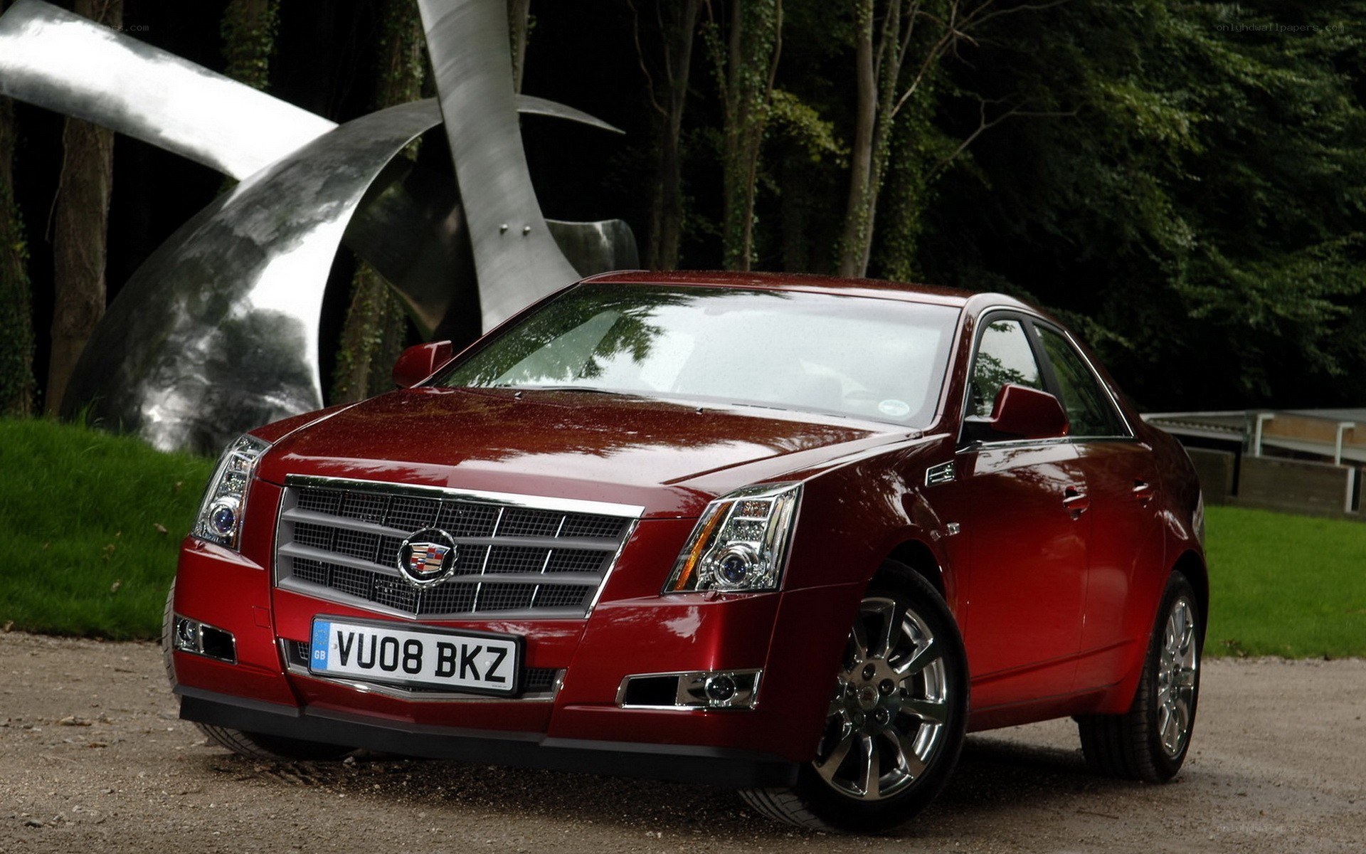 Red Cadillac CTS sedan