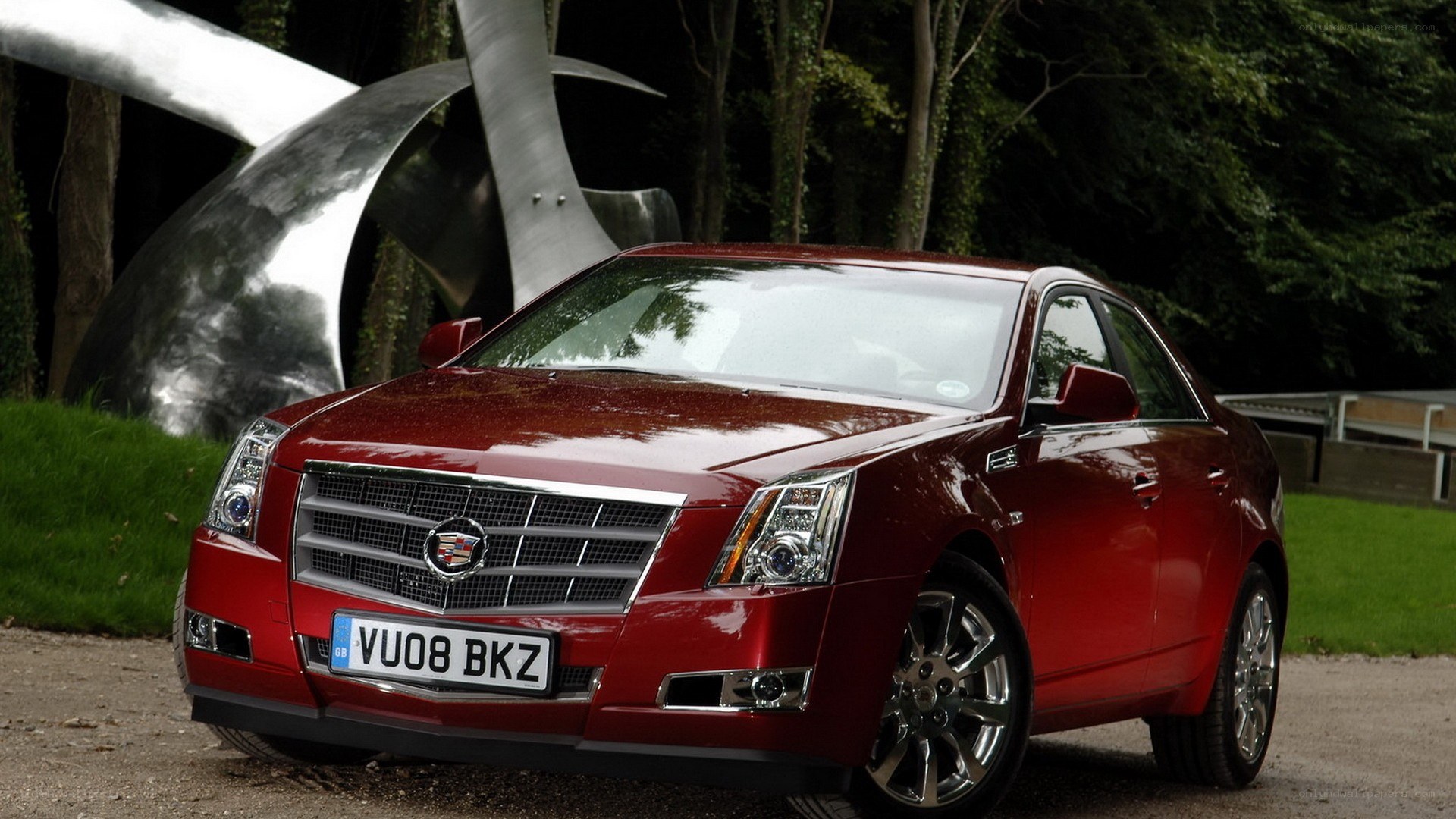 Red Cadillac CTS sedan