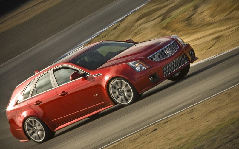 Red Cadillac CTS-V Wagon on track