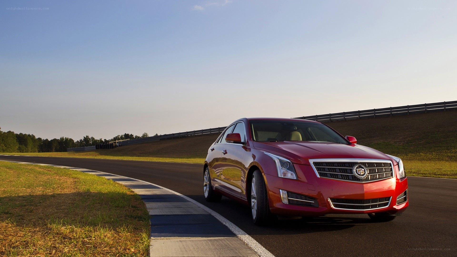 Red Cadillac on a racetrack