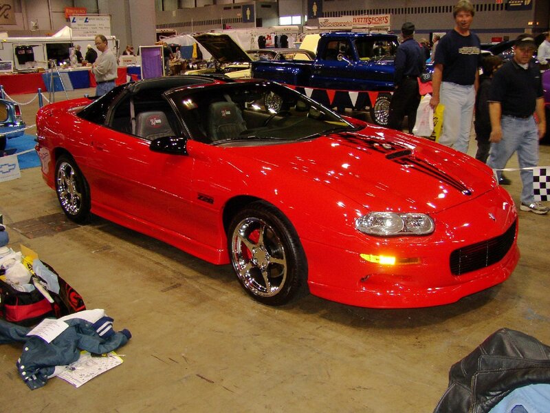Red Camaro at car show