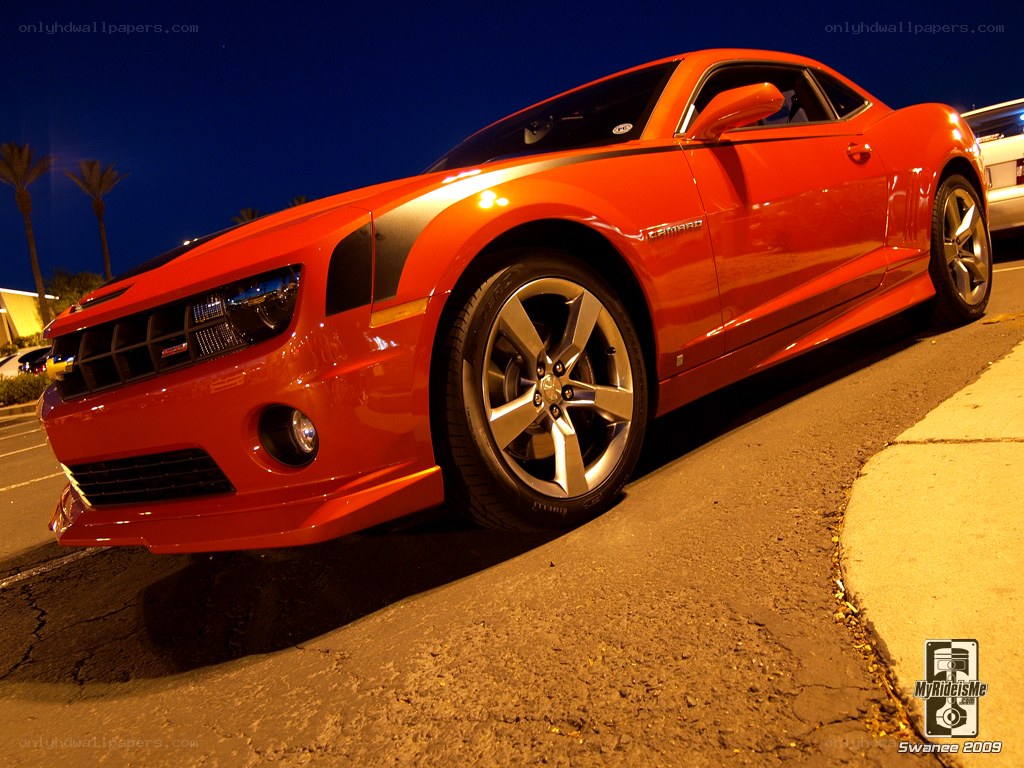 Red Camaro at night