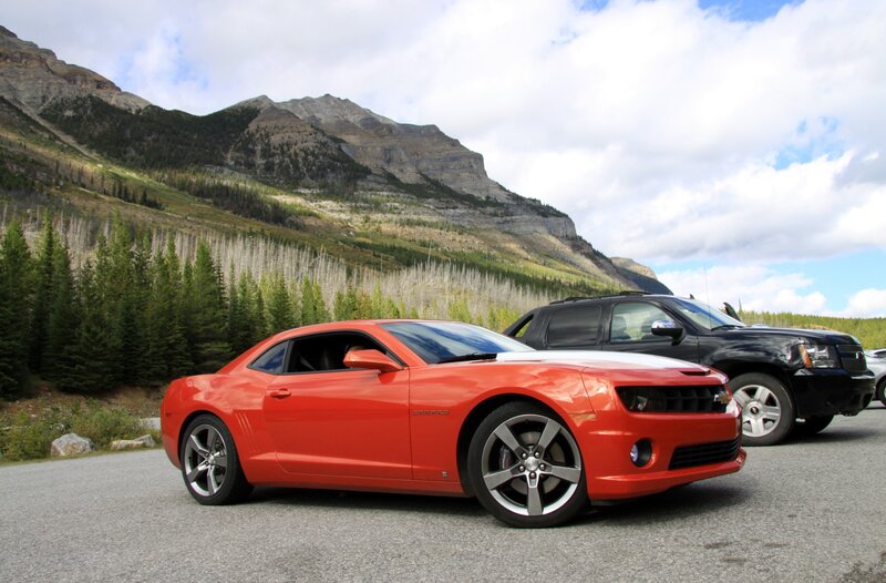 Red Camaro Car — Outdoor, Afternoon, Photograph, Black Suv