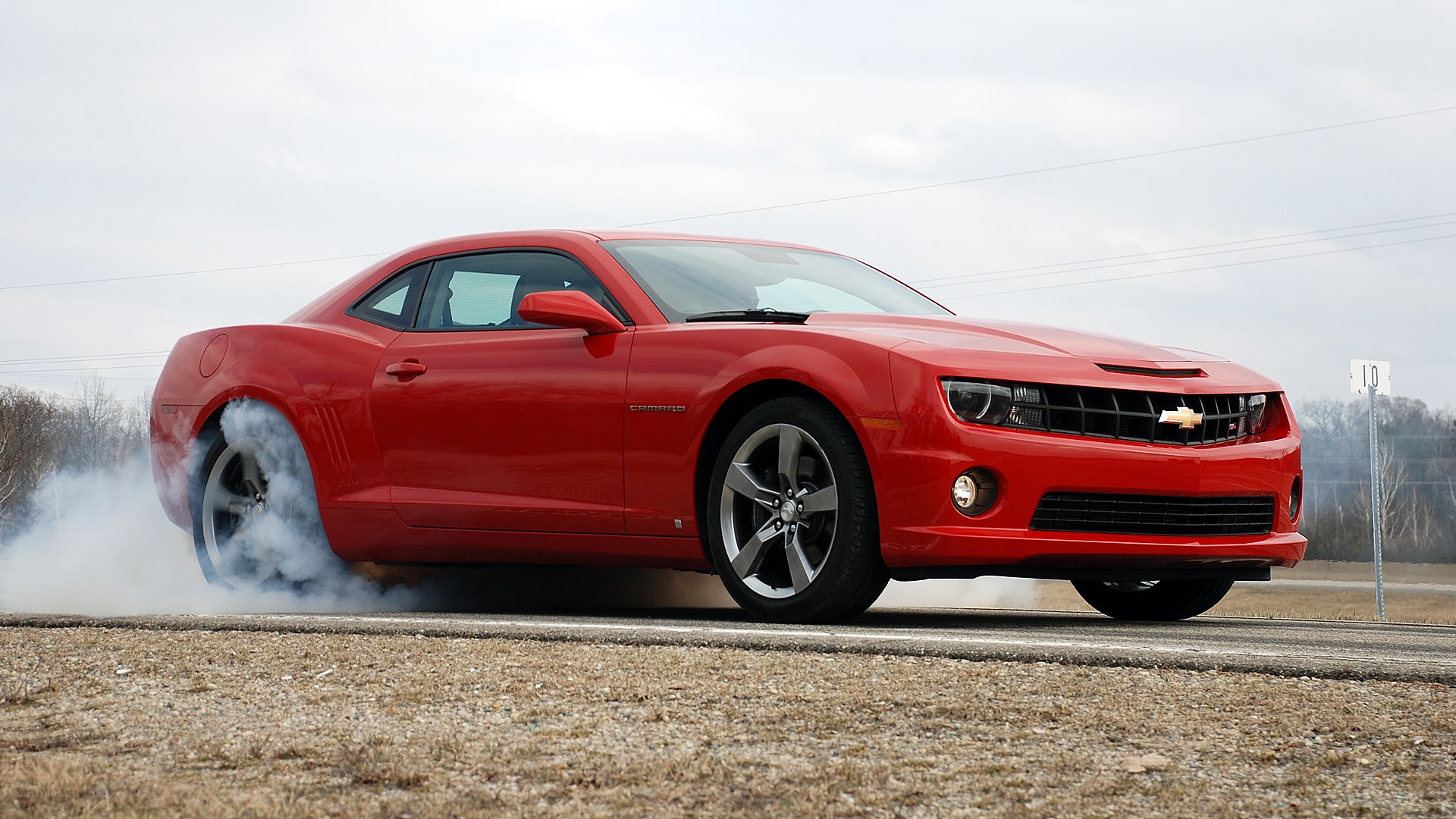 Red Camaro doing burnout