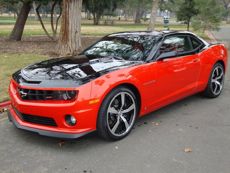 Red Camaro in a park