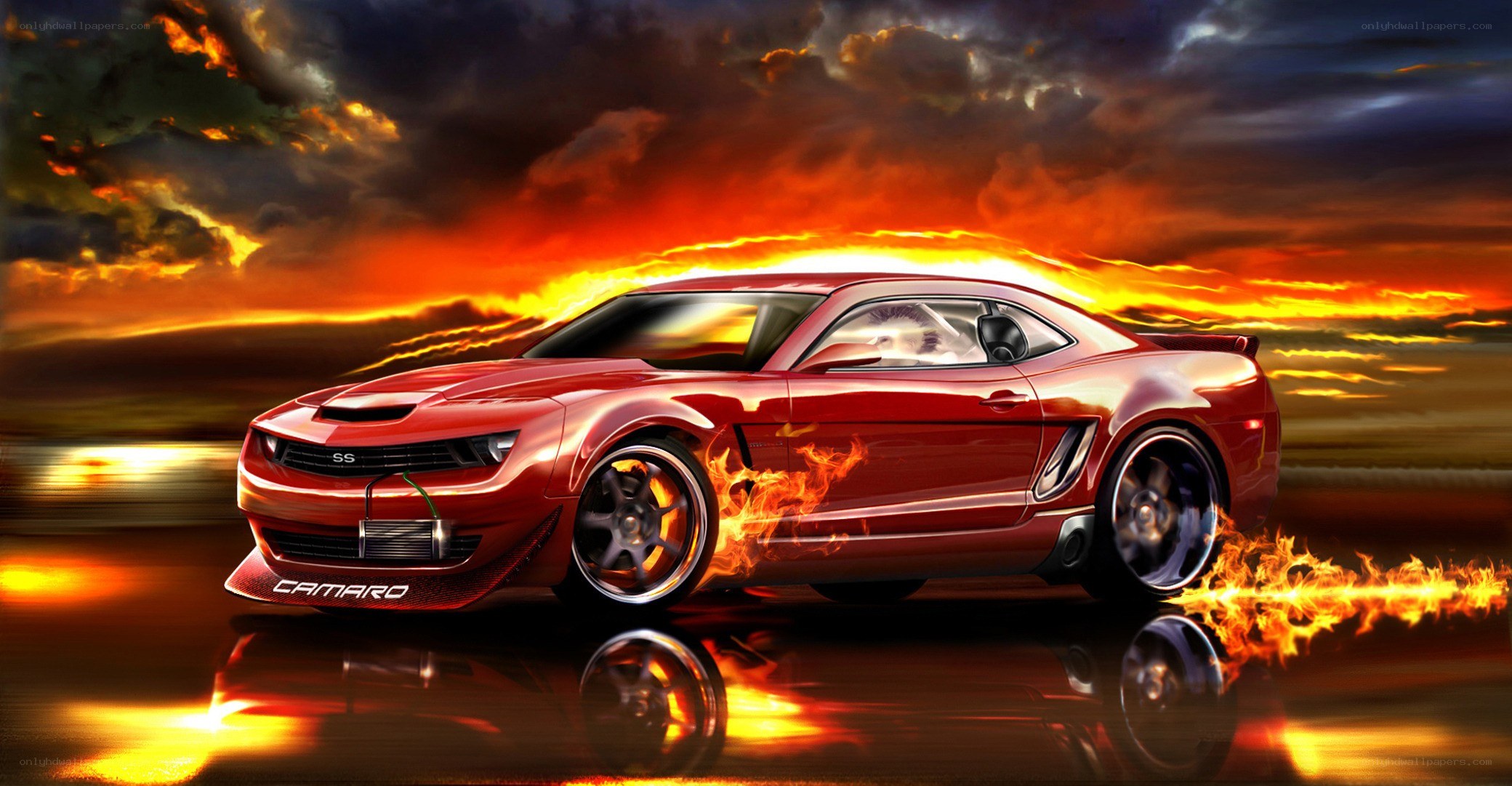 Red Camaro in fiery sunset