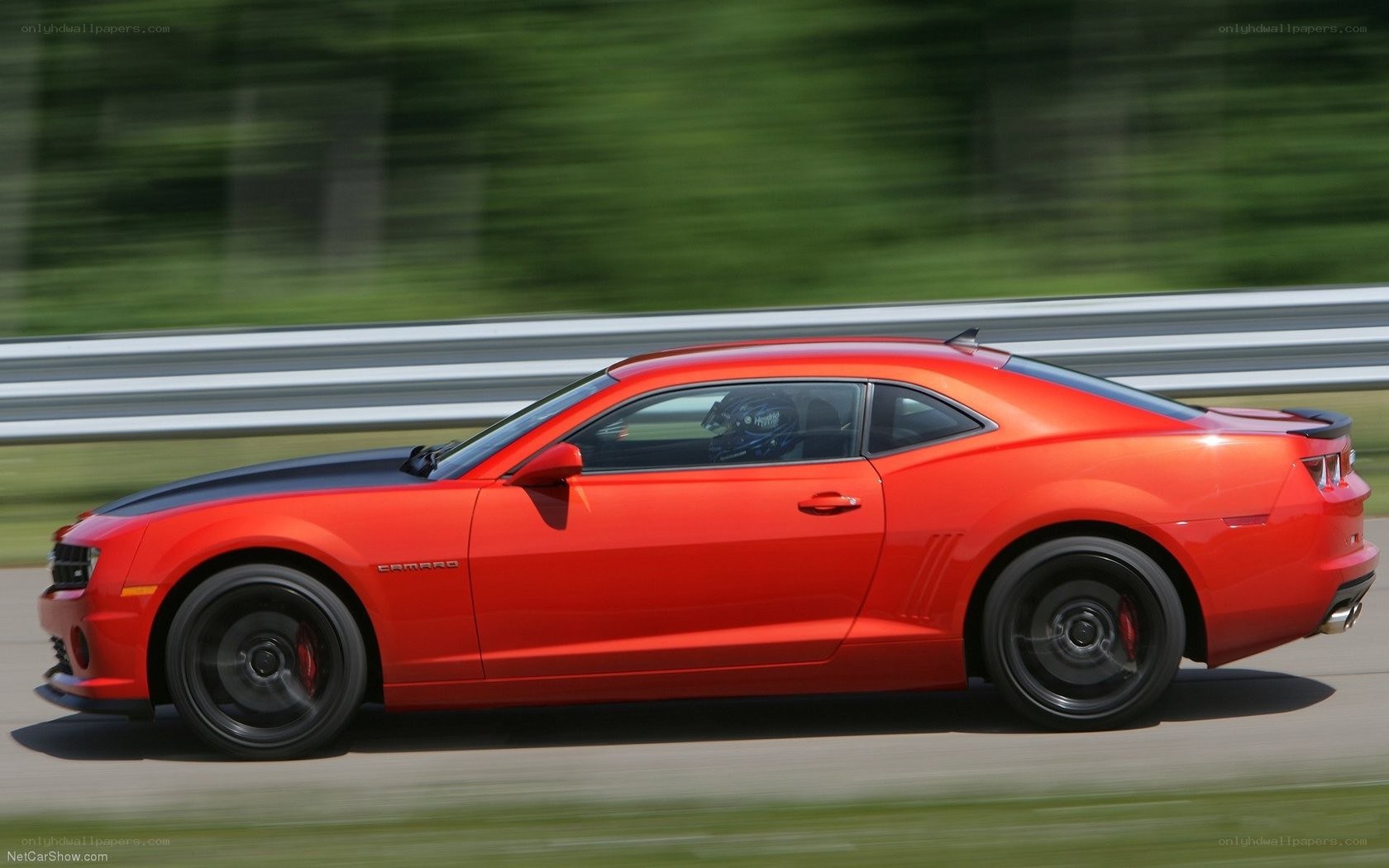 red camaro on a racetrack