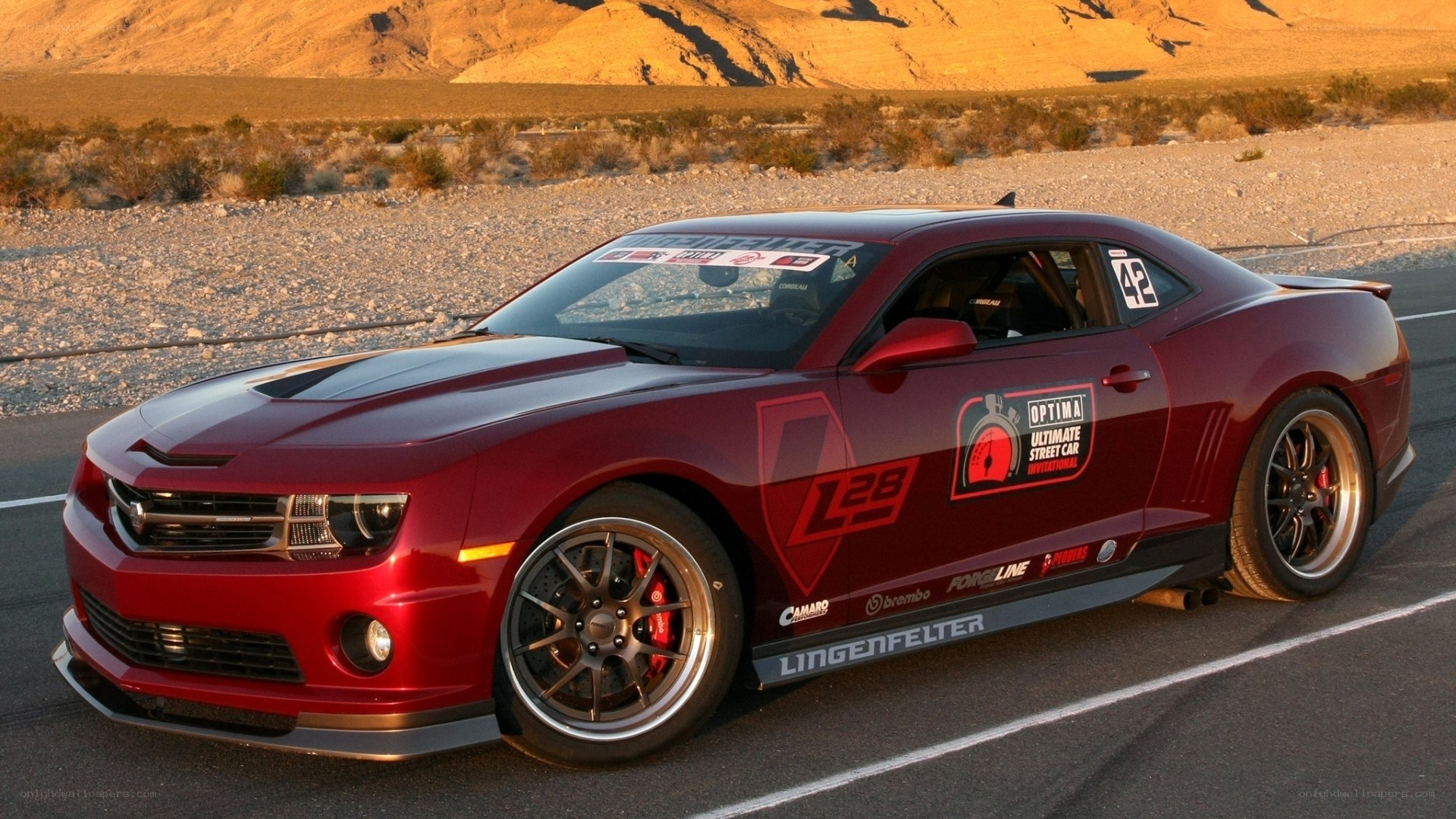 red camaro on desert track