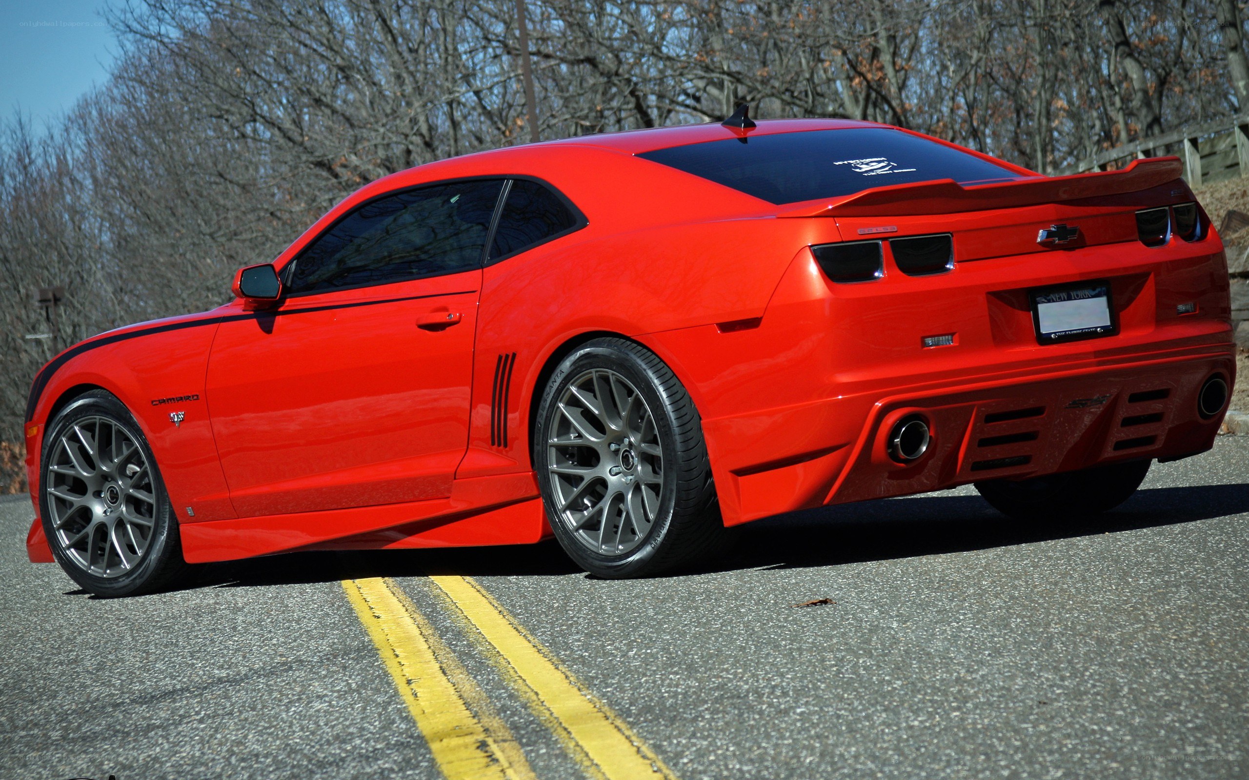 red camaro on road