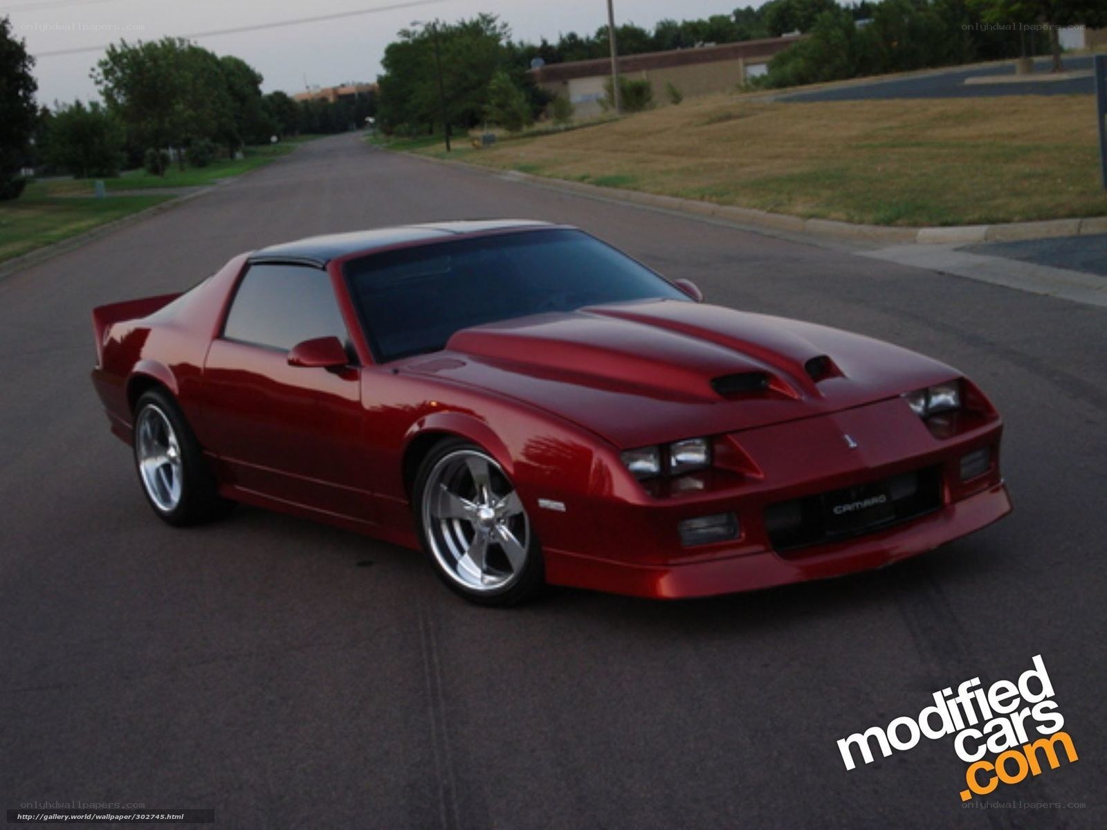 red camaro on street