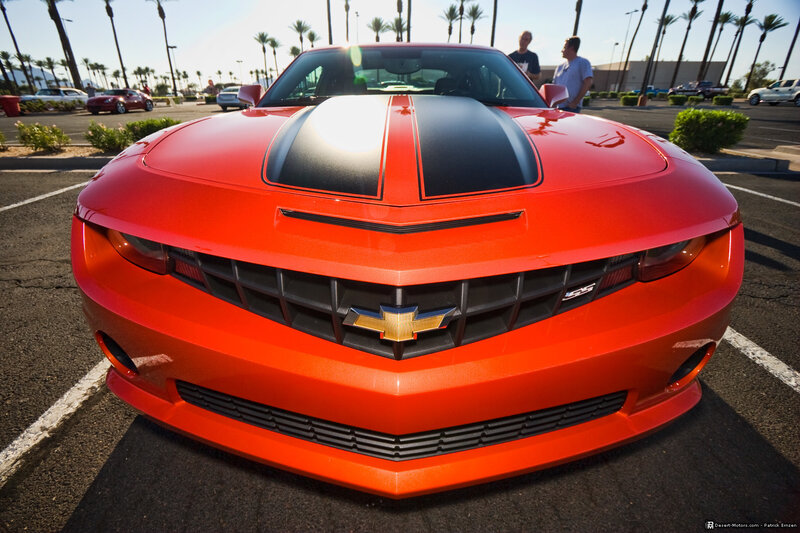 Red Camaro SS in parking lot