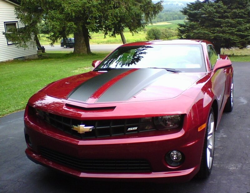 Red Camaro SS with racing stripes