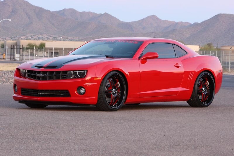 Red Camaro with black stripes