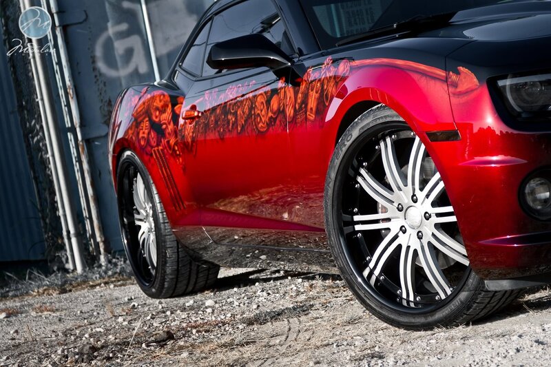 red camaro with custom graphics