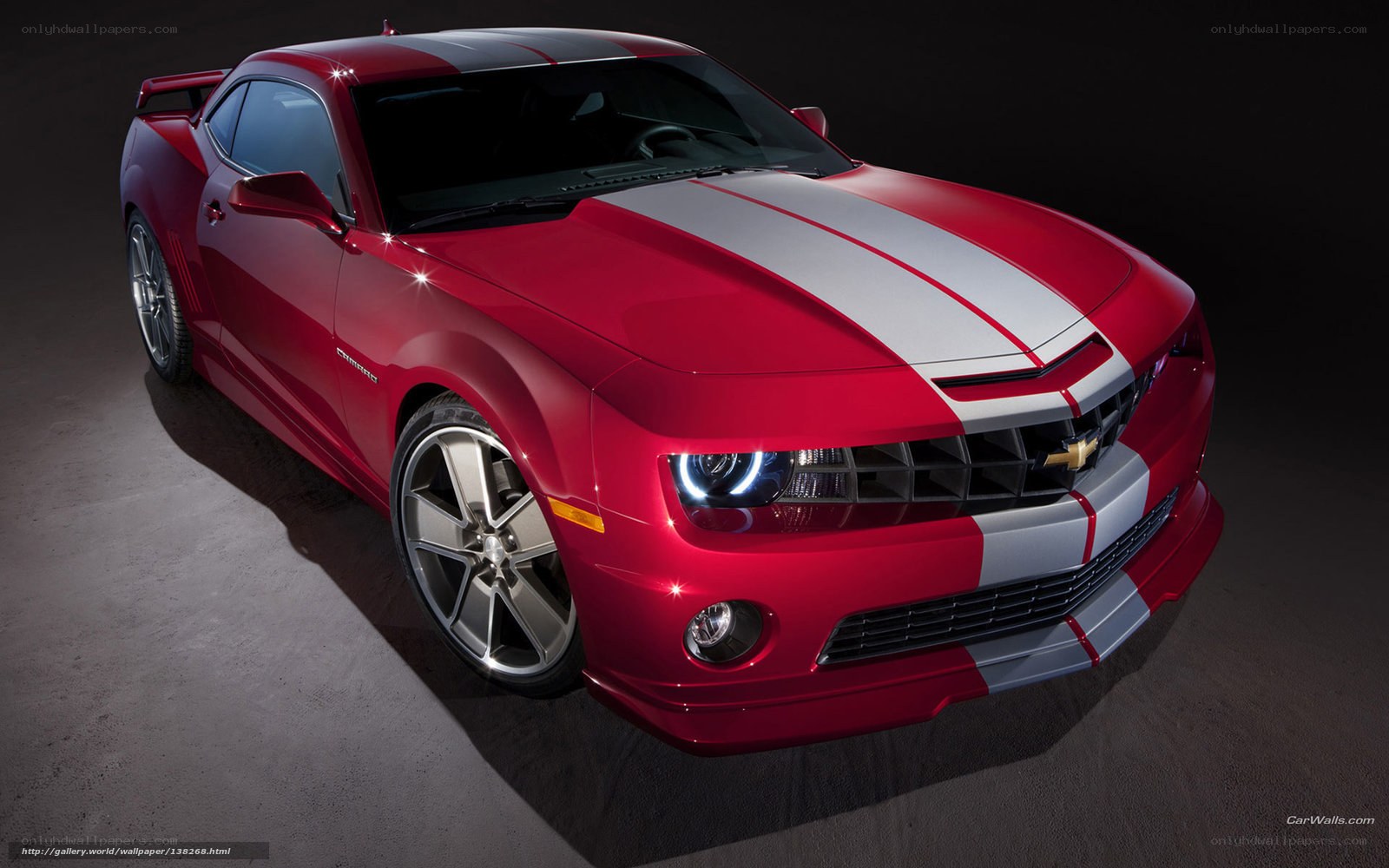 Red Camaro with racing stripes