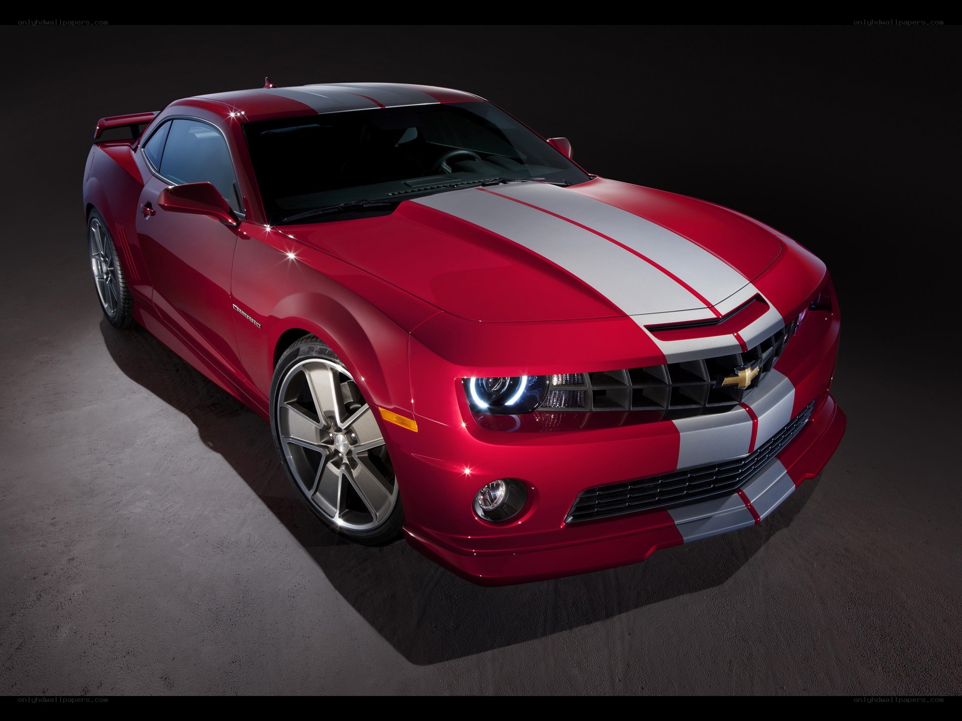Red Camaro with white stripes