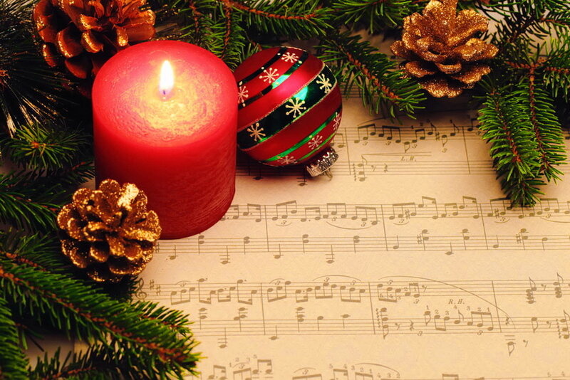 Red Candle on Sheet Music
